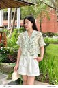 z6805968994607_0968525241ab2c7cbcf4b4ec12a35653 Ảnh của Áo kiểu cổ 2 ve dáng ngắn