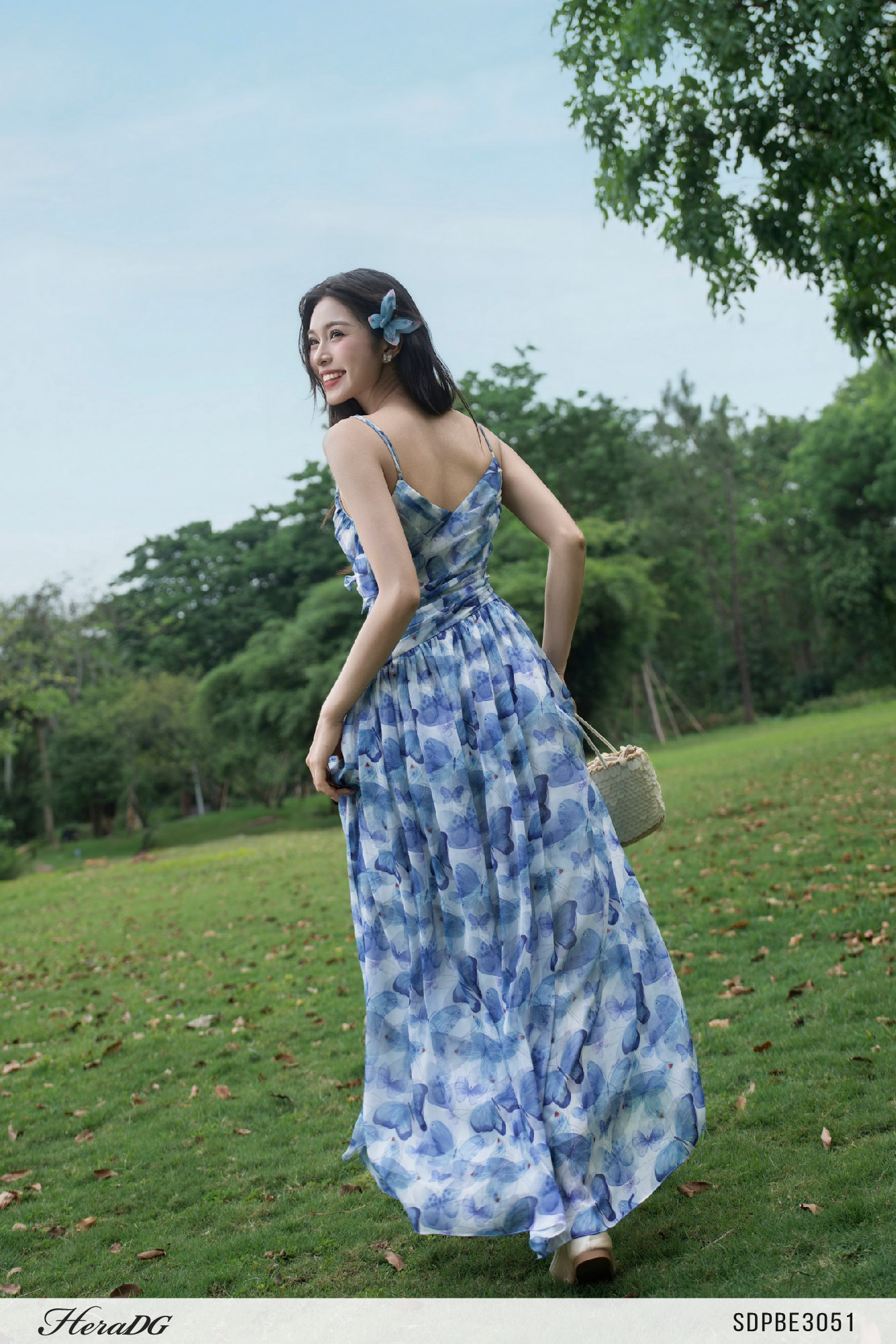 Ảnh của Đầm 2 dây cut out đính nơ