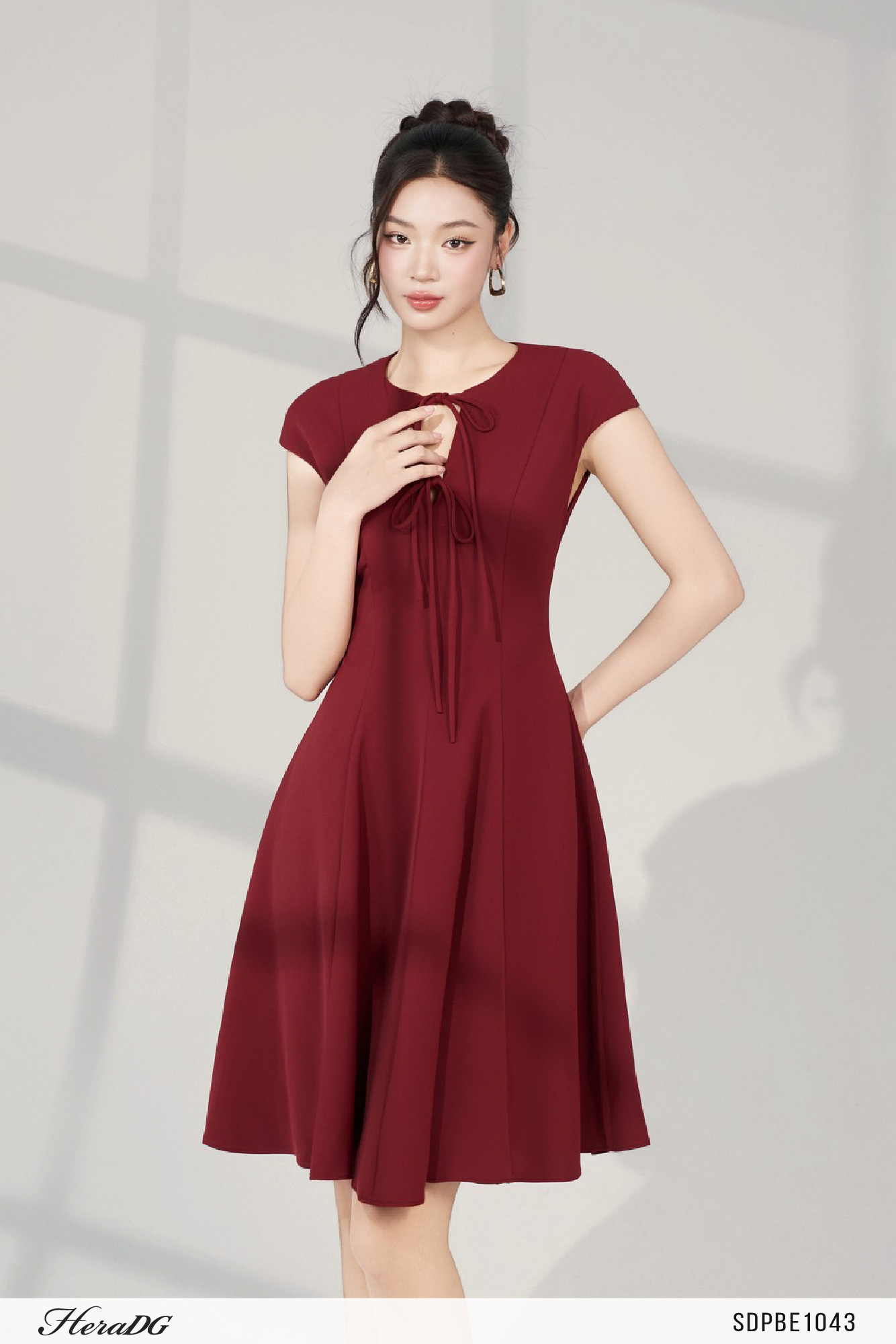 Ảnh của Đầm xoè tay liền cổ nơ