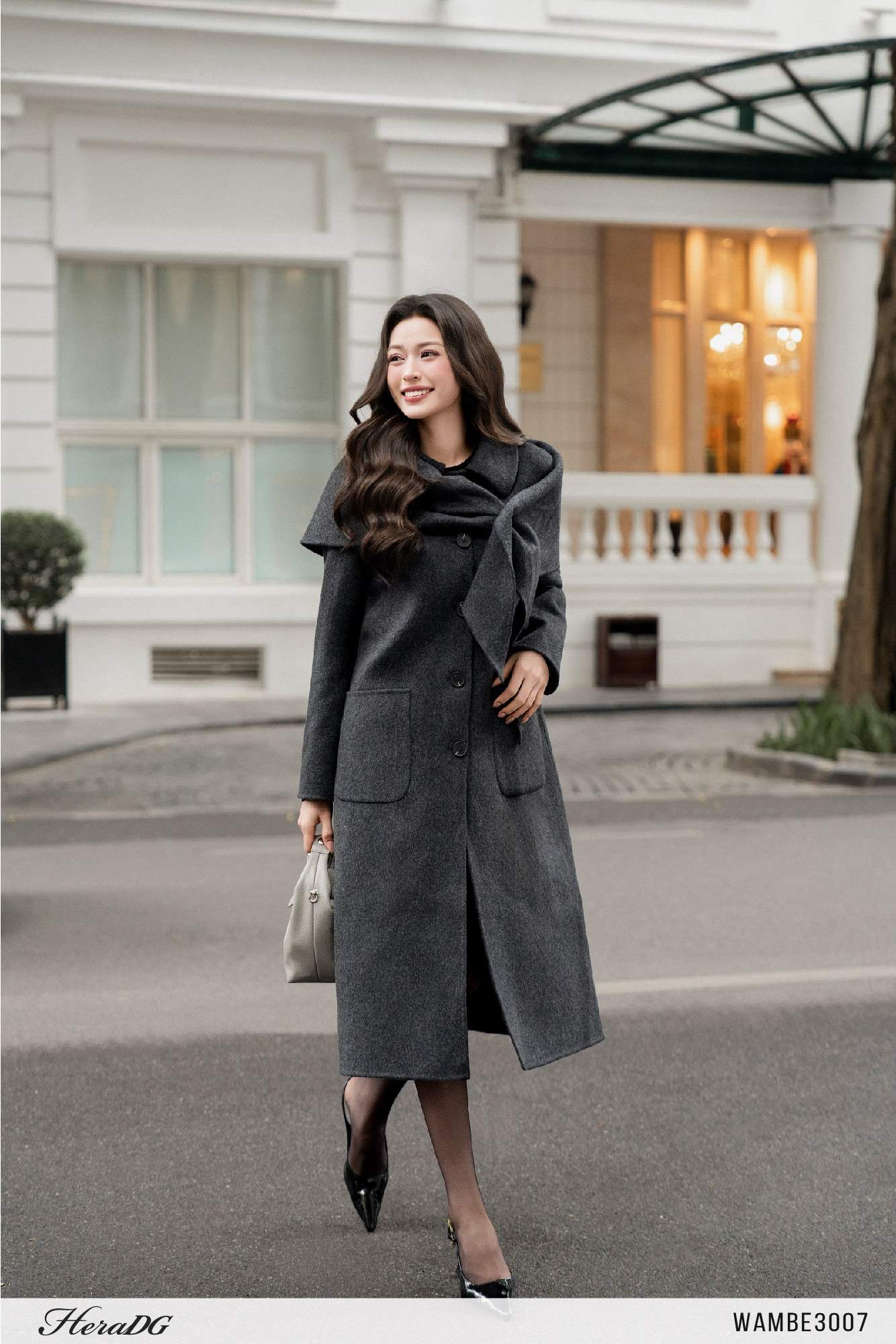 Ảnh của Áo khoác dạ khâu tay dáng dài