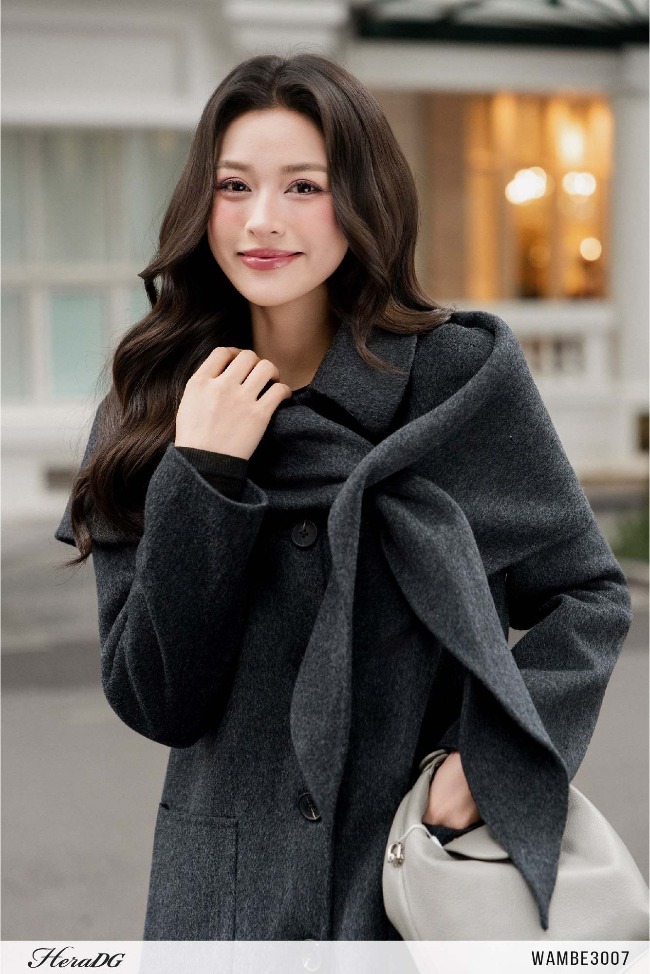 Ảnh của Áo khoác dạ khâu tay dáng dài